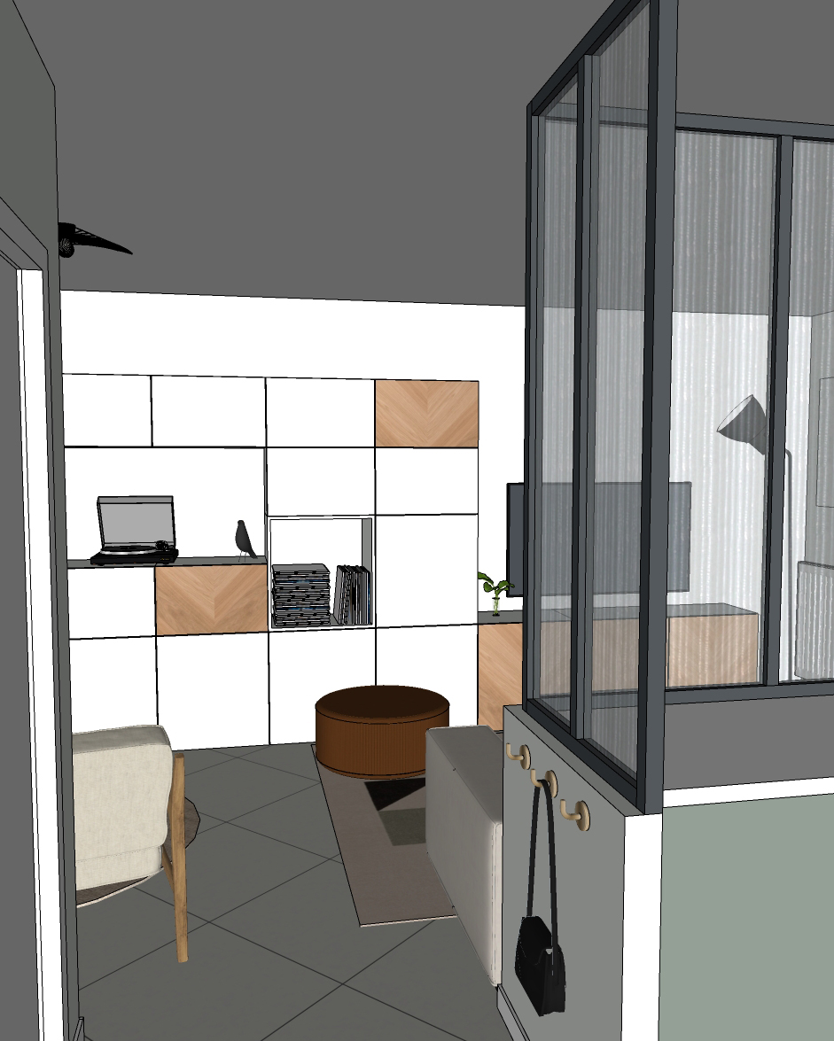 Réhabilitation d'un ancien pigeonnier en chambre d'hôtes, détail coin salon avec fauteuil en velours vert, chiffonnier en bois et cannage, radiateur fonte couleur cuivrée, au Merlerault dans le perche normand